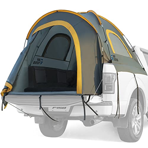 A JOYTUTUS pickup truck tent 2-person waterproof attached to the back of it.