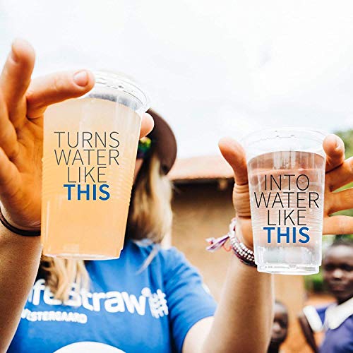 Lady hold a dirty glass of water and another glass that is clean after using the lifestraw