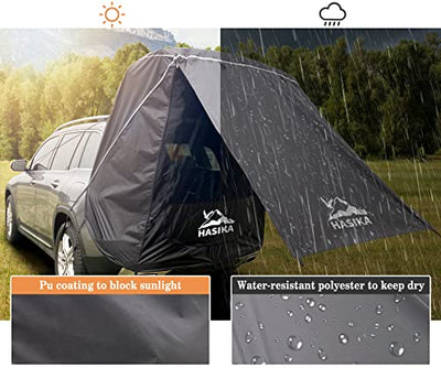 A picture of a HASIKA Tailgate Shade Awning Tent for Car Camping Road Trip Essentials Midsize to Full Size SUV Van Waterproof 3000MM UPF 50+ Black (Large) in the rain.
