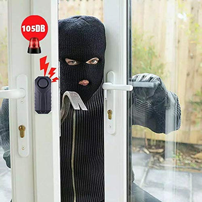 A person wearing a black mask is opening a door with the Hendun Bike Alarm Waterproof with Remote.