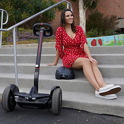 A woman sitting on steps with a Segway Ninebot S-Max Smart Self-Balancing Electric Scooter.