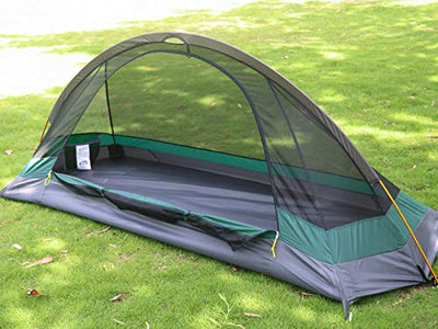 A Camppal 1-Person Tent Camping Hiking set up in the grass on a sunny day.