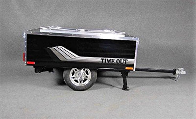 A Time Out Trailers Deluxe Camper with a boat on the back of it.