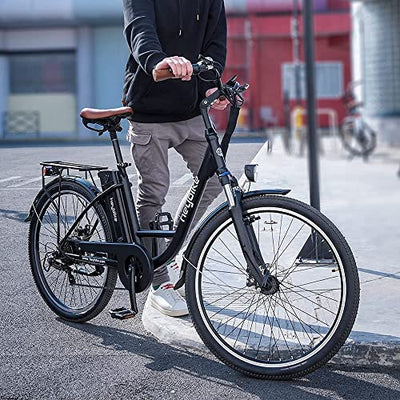 A man standing next to a Heybike Cityscape City Cruiser Electric Bike 350W 40-Mile Range 19 Mph on a city street.